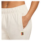 Women`s Court Dri-FIT Heritage Windrunner Poly Knit Pant Pale Ivory Apparel Nike